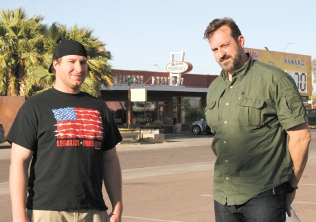 Phoenix residents Job Ladd, left, and Ted Lewis, who owns Lewis Interiors in the Melrose District, thwarted an armed robbery at Melrose Pharmacy on March 25. The men disarmed the suspect and kept their guns pointed at him until police arrived on the scene (photo by Patty Talahongva).