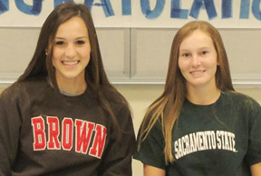 Megan Hauptman, left, and Katie Dunaway, Xavier College Prep seniors and golfers, recently signed their letters of intent (submitted photo).