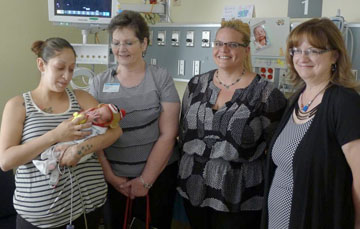 Tiny babies receive donated tiny caps