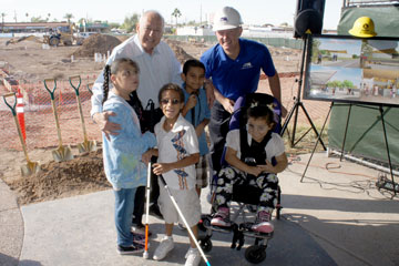 Don Tapia, left, a longtime supporter of the Foundation for Blind Children, and the nonprofit’s CEO Marc Ashton celebrate the campus’s $10 million expansion with some of the children who attend FBC (photo by Teri Carnicelli).