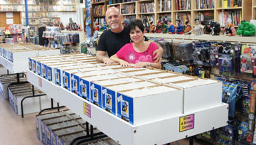 Alan and Marsha Giroux, owners of All About Books and Comics, have lost their lease and are seeking the community’s help to raise funds to move their massive inventory to their new space just around the corner (photo by Teri Carnicelli).