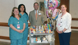 Hospital employees donate school supplies