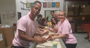Hilton team members volunteer at food bank