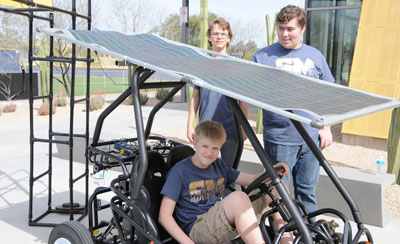 Students from Shadow Mountain High School in north Phoenix show off their solar-powered go-cart. The school’s GenYES program is internationally recognized in tech leadership, innovation, coding projects, micro processing, web applications and computer hardware. SMHS GenYES students regularly provide workshops and present their tech expertise at national events (submitted photo).