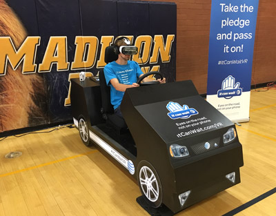 Simon Bowen, a freshman at Madison Highland Prep, test-drives AT&T’s virtual reality simulator (submitted photo).
