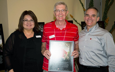 From left: Lillian Garcia, Red Cross Regional Volunteer Services officer for the Arizona-New Mexico-El Paso Region; Michael Young, Red Cross Rookie of the Year; and David Emerson, Red Cross CEO for Arizona-New Mexico-El Paso Region (photo by Todd Tamcsin).