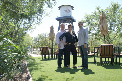 The creative team behind the new adaptive-use, multi-space development called The Orchard PHX includes husband-and-wife team Ken and Lucia Schnitzer of Luci’s Healthy Marketplace and their business partner (right), Jerry Mansoor (photo by Teri Carnicelli).