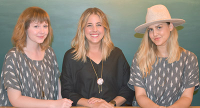Lauren Danuser (center), owner clothing and accessories boutique Local Nomad, along with staffers Lavi Popitan (right) and Megan Gilroy, are excited about the store opening in the recently remodeled Uptown Plaza shopping center at Central Avenue and Camelback Road (submitted photo).