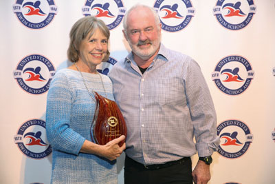 Swim school association honors local couple
