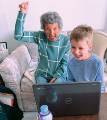 Brody Contreras, a first-grader at Madison Camelview Elementary School, recently danced with his great grandmother, Julia Fulkerson, pictured here. A video of the two of them doing this virtual workout received more than 400,000 views on social media (photo by Angela Groch).