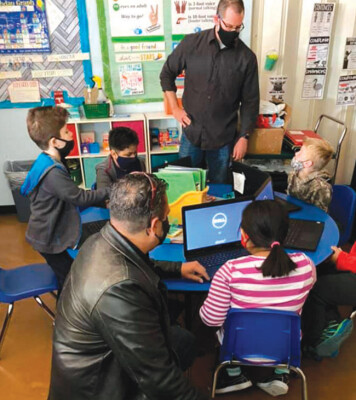 Midtown Primary School recently received support from the Million Dollar Teacher Project, which donated 60 computers and 20 WiFi hotspots to the school (photo courtesy of Midtown Primary School).