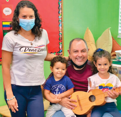 Wife and husband Neudysmar and Jose, along with their children Anthony and Nahomi, participate in a lesson about Venezuela at Phoenix Christian Preschool. Students in the preschool have been exploring different cultures through music, dance, song, eating food and other activities during the summer program (photo courtesy of Phoenix Christian Preschool).