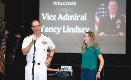 Vice Admiral Yancy Lindsey, Commander, Navy Installations Command, presented a special “Challenge Coin” to Phoenix Christian junior Hana Marz during a recent visit. Lindsey graduated from Phoenix Christian in 1980 (photo by Sandra Tenuto Photography).