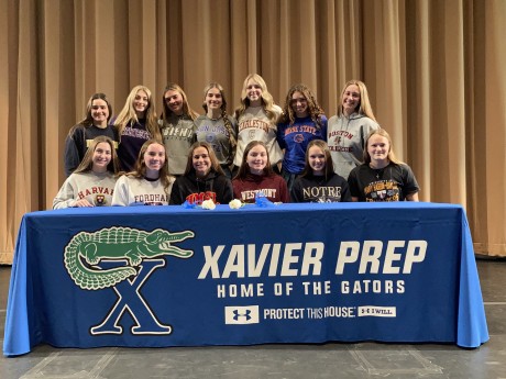 Several Xavier College Preparatory seniors, pictured here, recently signed letters of intent to play sports as student-athletes at various universities around the country, starting in the fall of 2022. They are (front row, from left): Riley Flynn, Hope Nolan, Ashleigh Baros, Alexa Shiner, Kathleen Morgan and Alicia Jasinski; and in the second row, from left: Gracie Munk, Bridget Donahey, Emma Petersen, Landree Coats, Isabella Sinacori, Ryan Kershner and Megan Schouten (photo by Lisa Zuba).