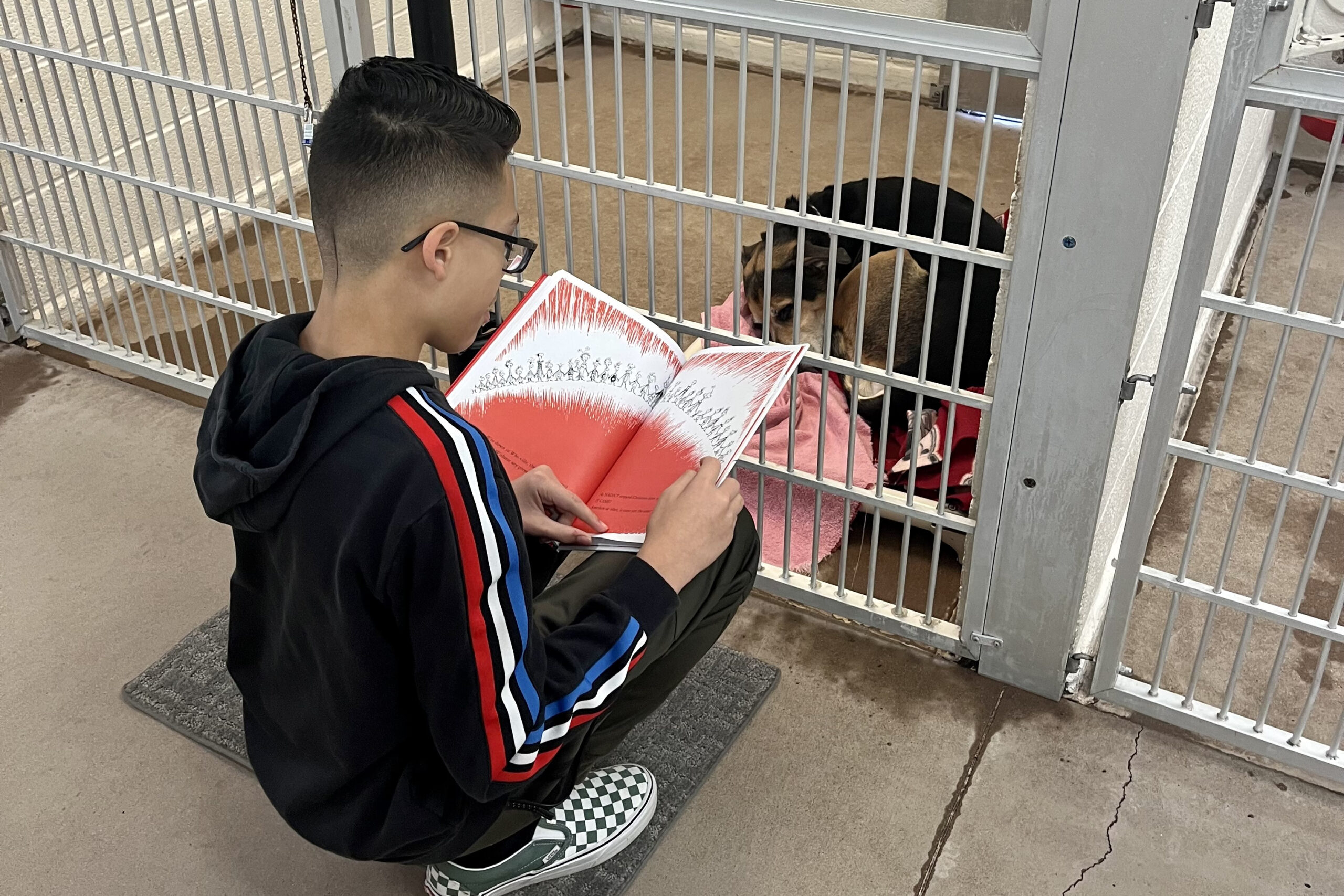Reading program helps shelter pups